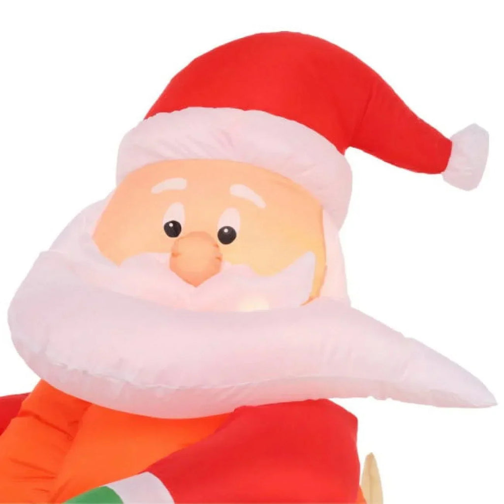 Home Accents Holiday 5 Ft. Pre-Lit LED Inflatable Santa on Watercraft Sleigh Scene